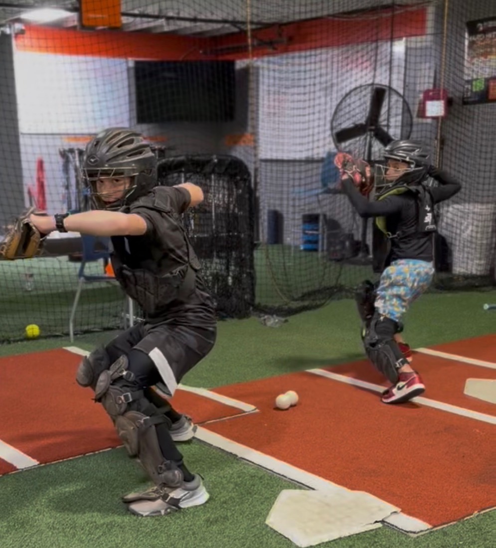 Young catchers training with Coach Juan