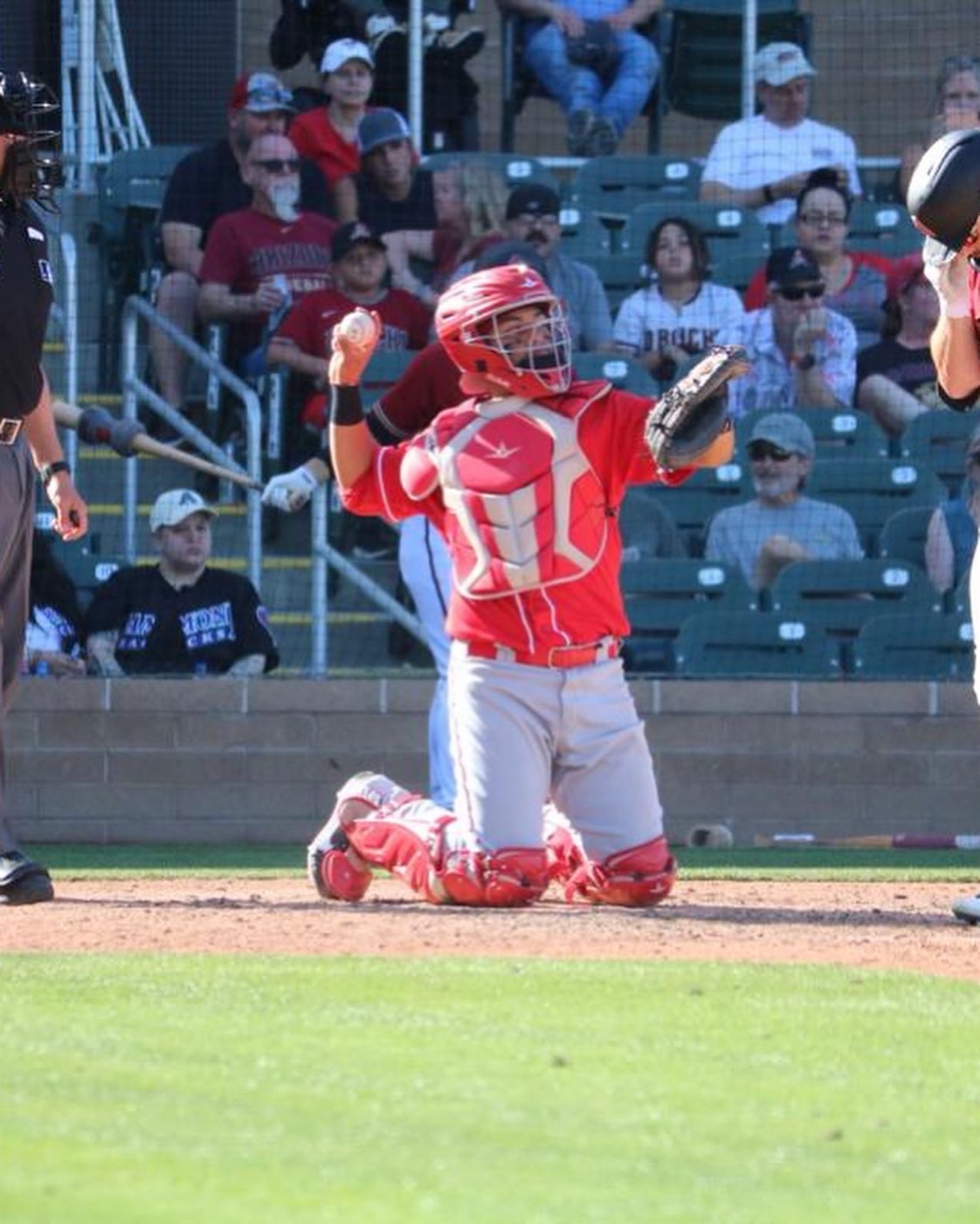 Juan Garcia catching in a game
